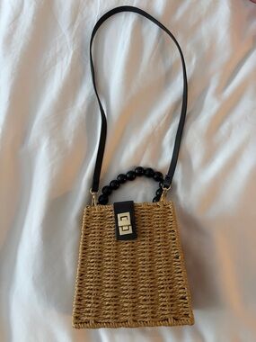 Woven Straw Crossbody Bag with Black Beaded Handle